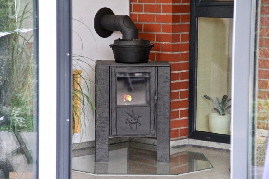 Kaminofen im Wintergarten Einfamilienhaus Neubrandenburg