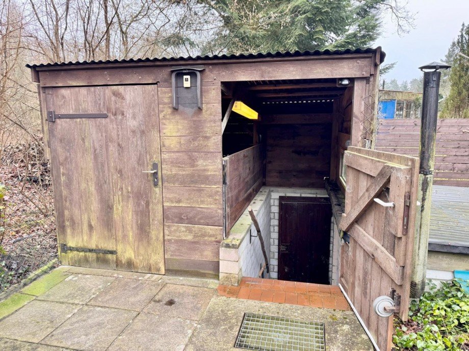 Fahrradschuppen und Kellereingang Ferienhaus Wokuhl-Dabelow / Carolinenhof