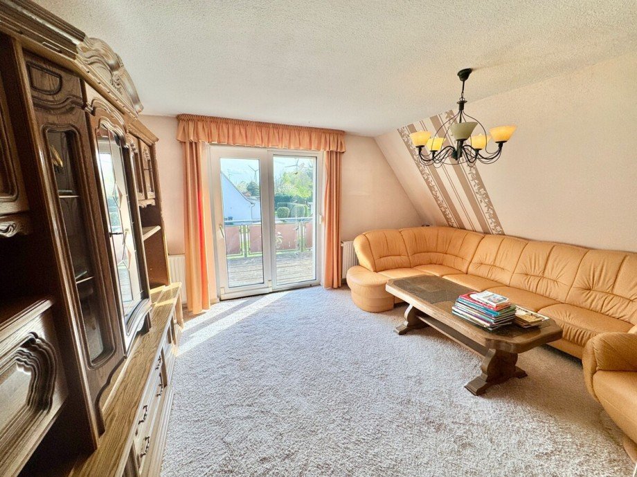 Wohnzimmer Dachgeschoss mit Balkonterrasse Einfamilienhaus Werder OT Wodarg