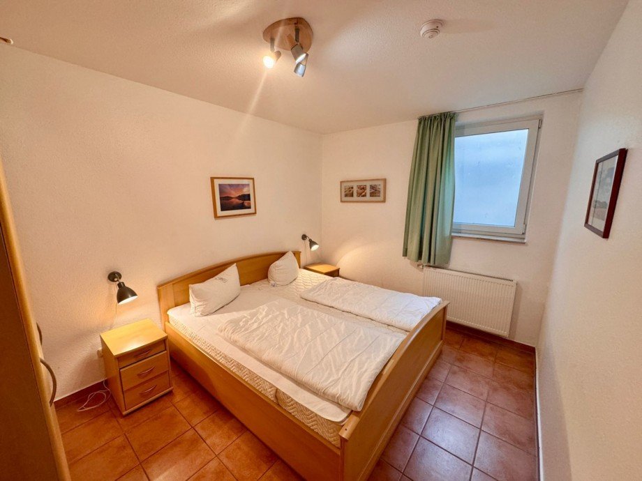 Schlafzimmer Souterrain Ferienhaus R�bel/M�ritz