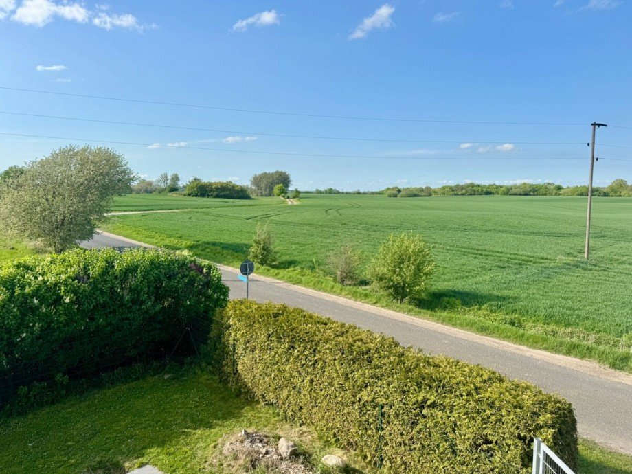 Aussicht aus dem Fenster Giebelseite Einfamilienhaus Kublank