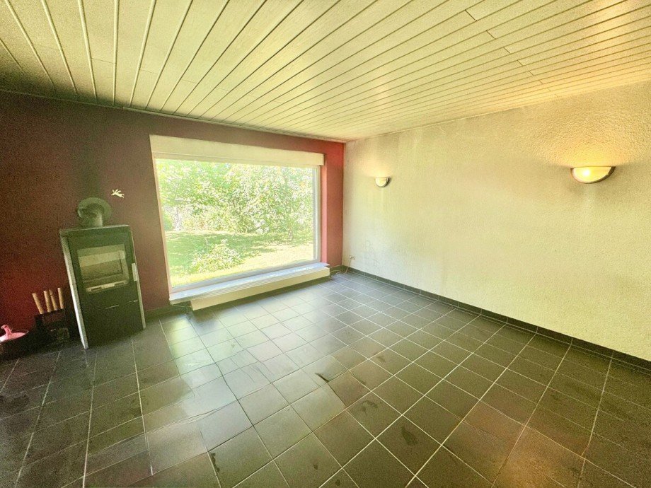 Wohnzimmer mit Kamin Einfamilienhaus M�llenbeck