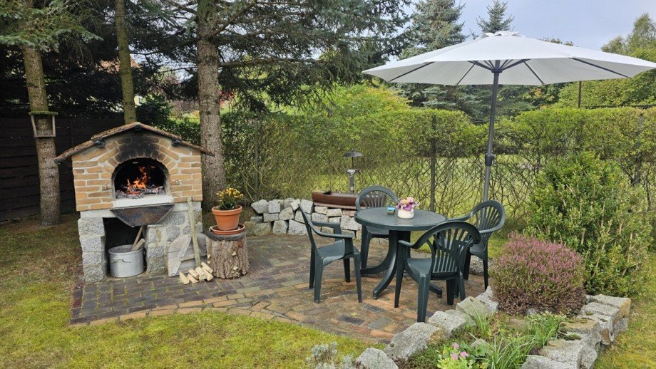 gem�tliche Ecke mit Au�enkamin Ferienhaus Wokuhl-Dabelow / Carolinenhof