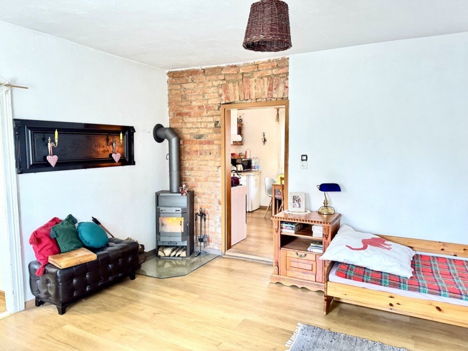 Wohnzimmer mit Kamin Einfamilienhaus Jatznick / Sandf�rde