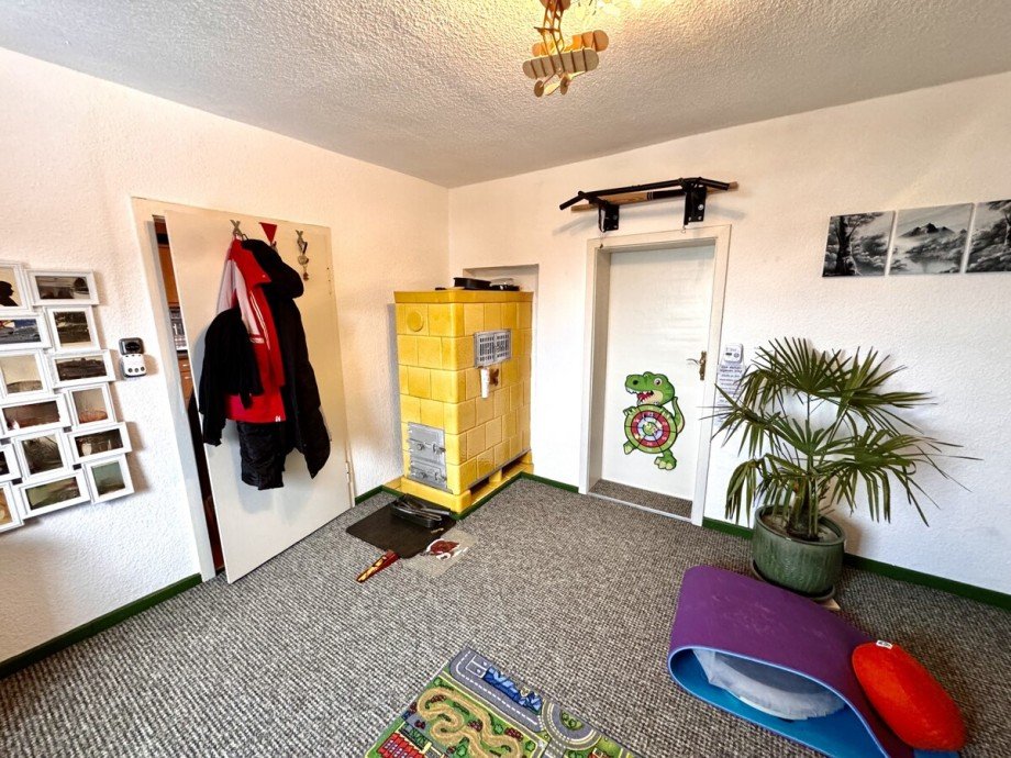 Kinderzimmer mit Kachelofen Einfamilienhaus Wilhelmsburg