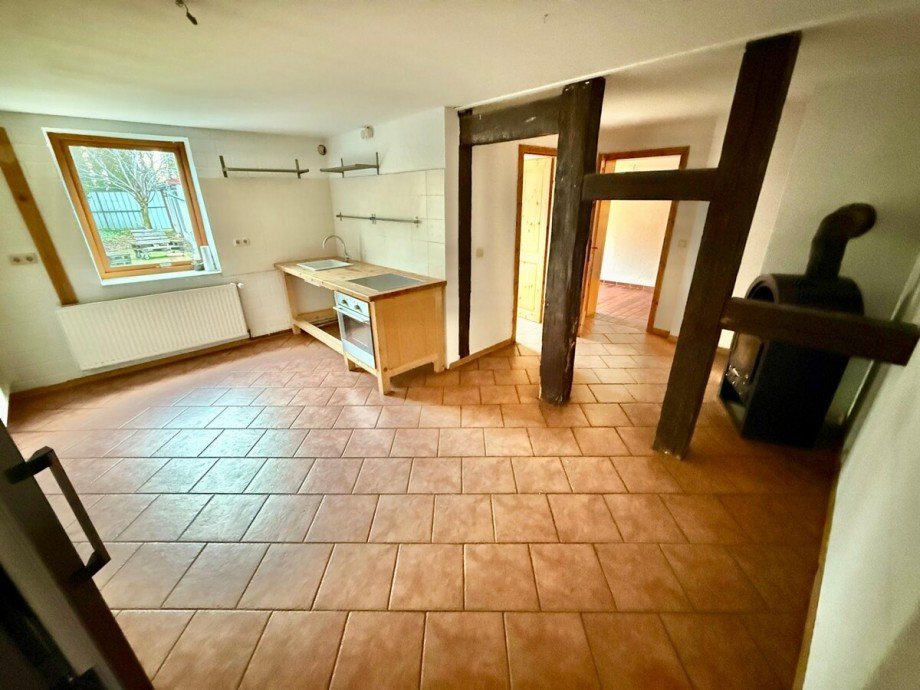 K�che mit Kaminofen Einfamilienhaus Friedland