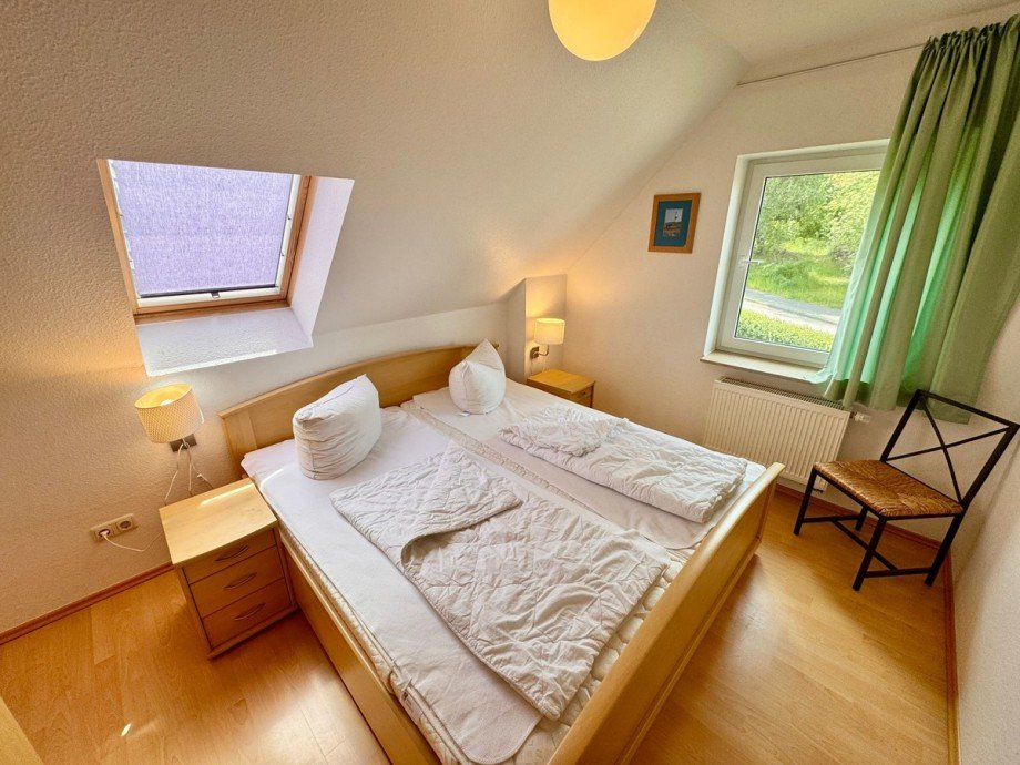 Schlafzimmer Dachgeschoss Ferienhaus R�bel/M�ritz